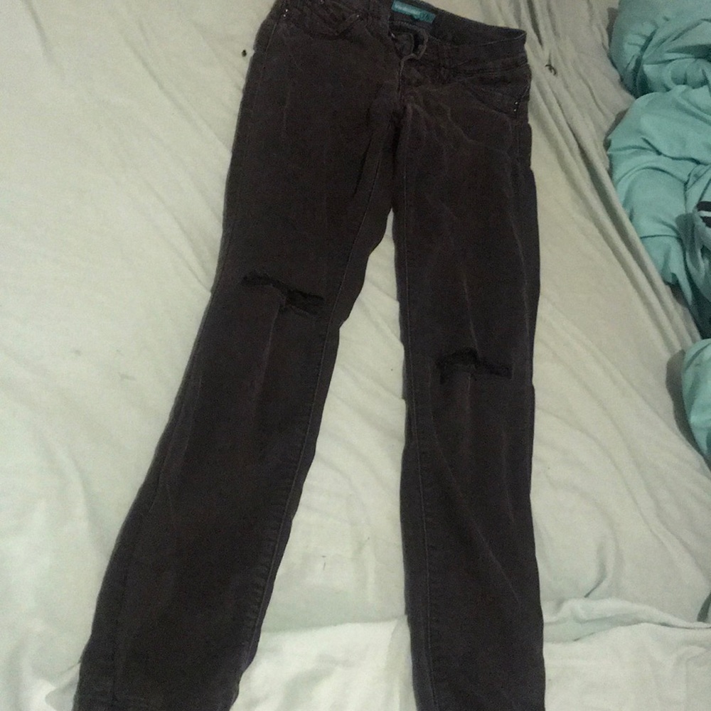 Black ripped knees skinny jeans with butt lift
